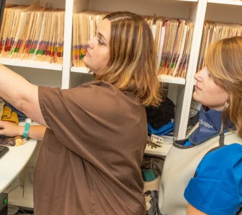 Staff members determining diagnostics at The Animalife Veterinary Center at Mission Hills